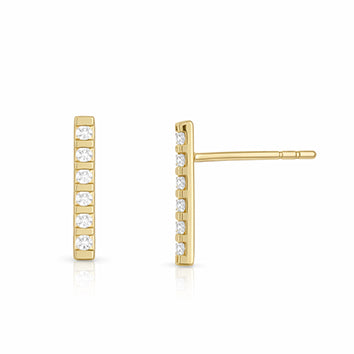 Clou oreille femme or jaune 9 carats barre zirkonia
