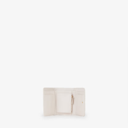 Portemonnaie femme cuir écru motif monogramme embossé