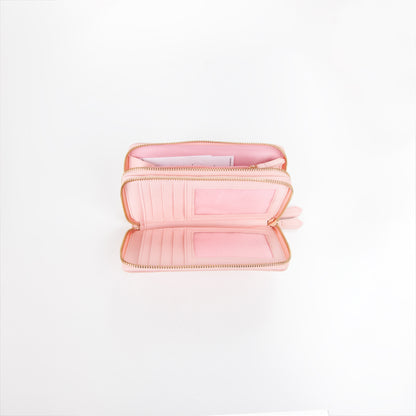 Portefeuille femme zippé grain rose poudré touches dorées