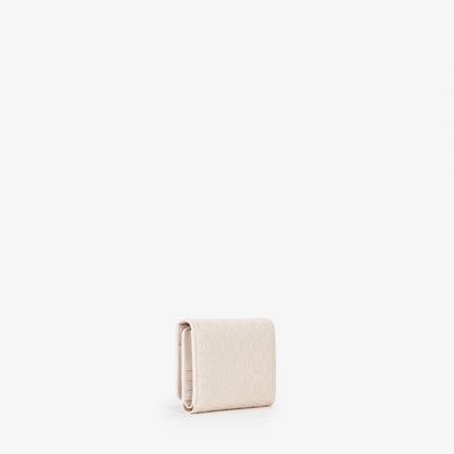 Portemonnaie femme cuir écru motif monogramme embossé