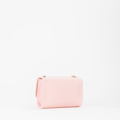 Sac bandoulière femme rose pâle chaîne dorée à pompon