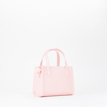 Sac à main femme rose poudré avec breloque dorée