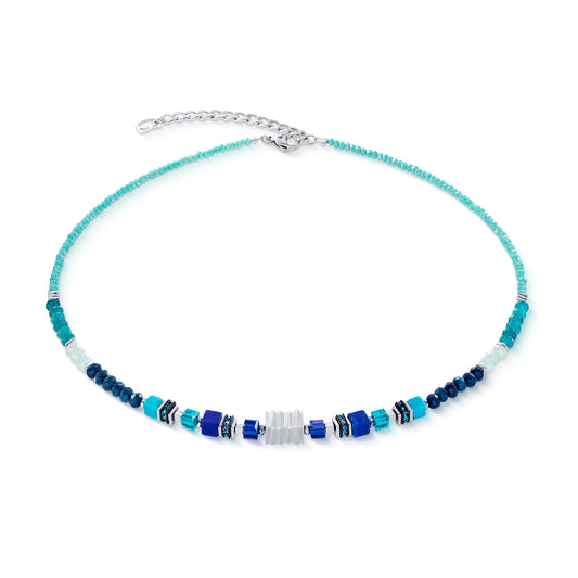 Lapis-lazuli, turquoise, jade teinté, hématite avec finition à l'oxyde de titane, rondelles de strass, verre taillé, acier inoxydable